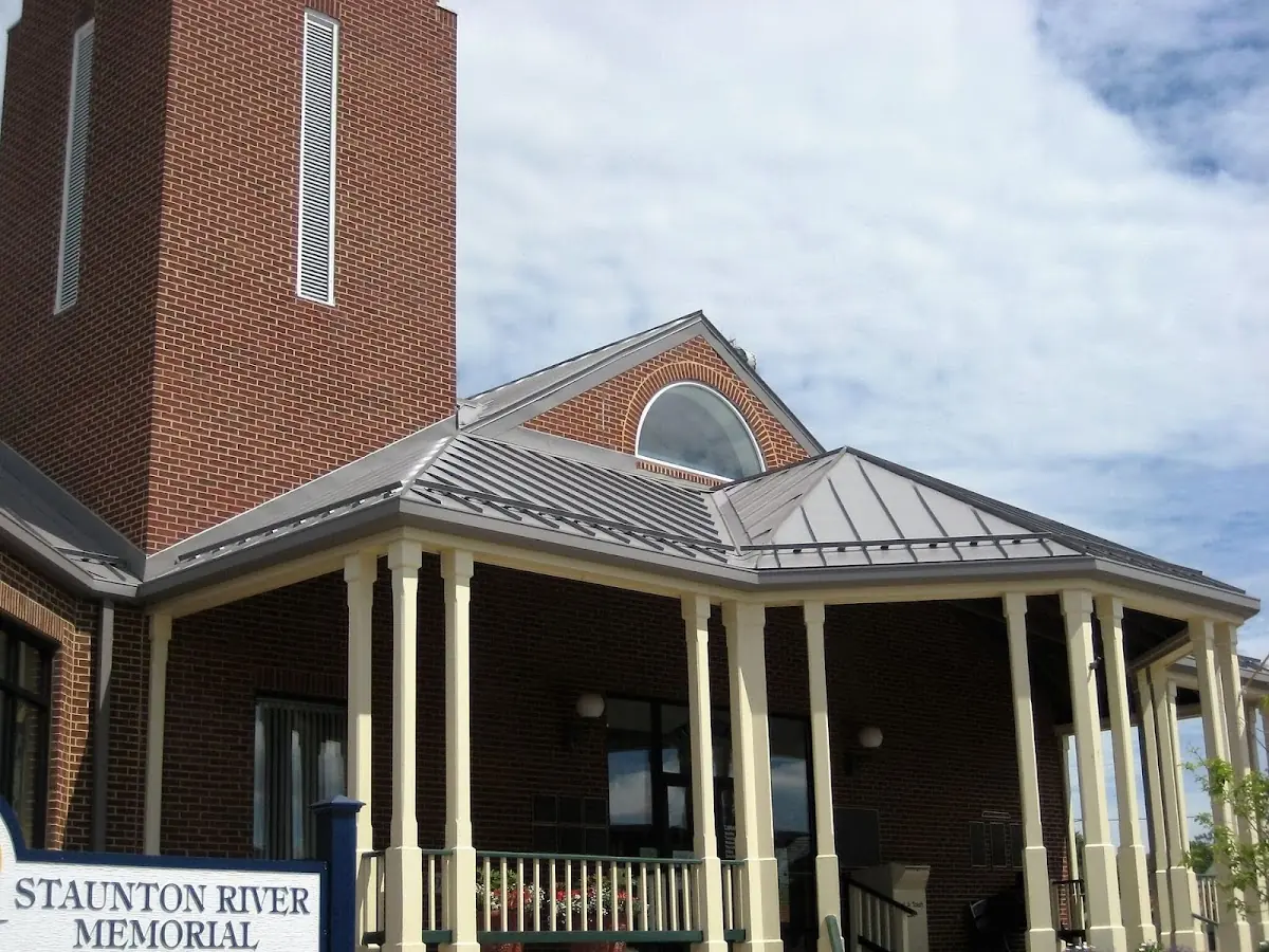 Skilled roofing craftsmen working on a residential roof in Hot Springs